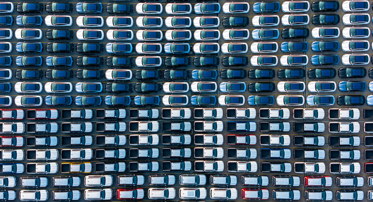 Aerial top view car park at sea port or manufacture waiting for logistics.